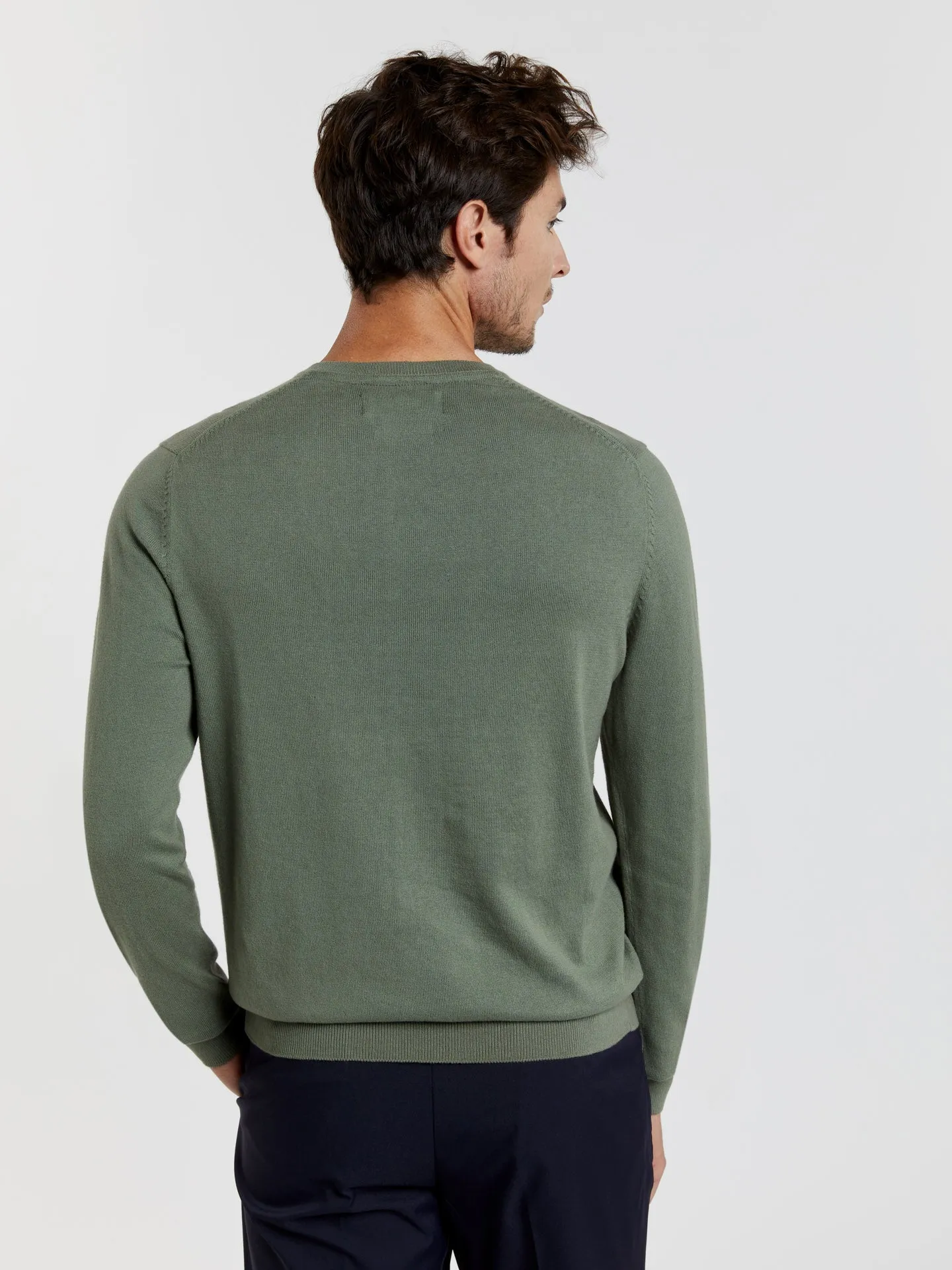 V-neck sweater with denim dye effect